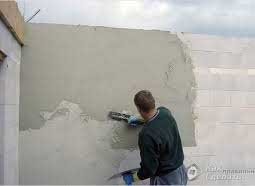 Как оштукатурить стены из пенобетона 